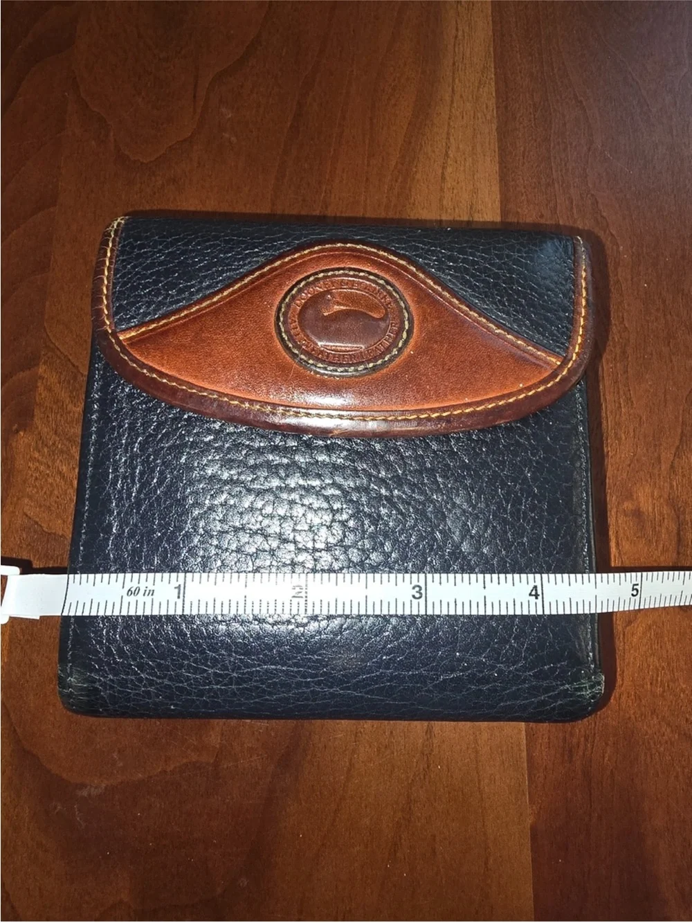 Dooney & Bourke Black and Brown Leather Bi-Fold Wallet vintage.
